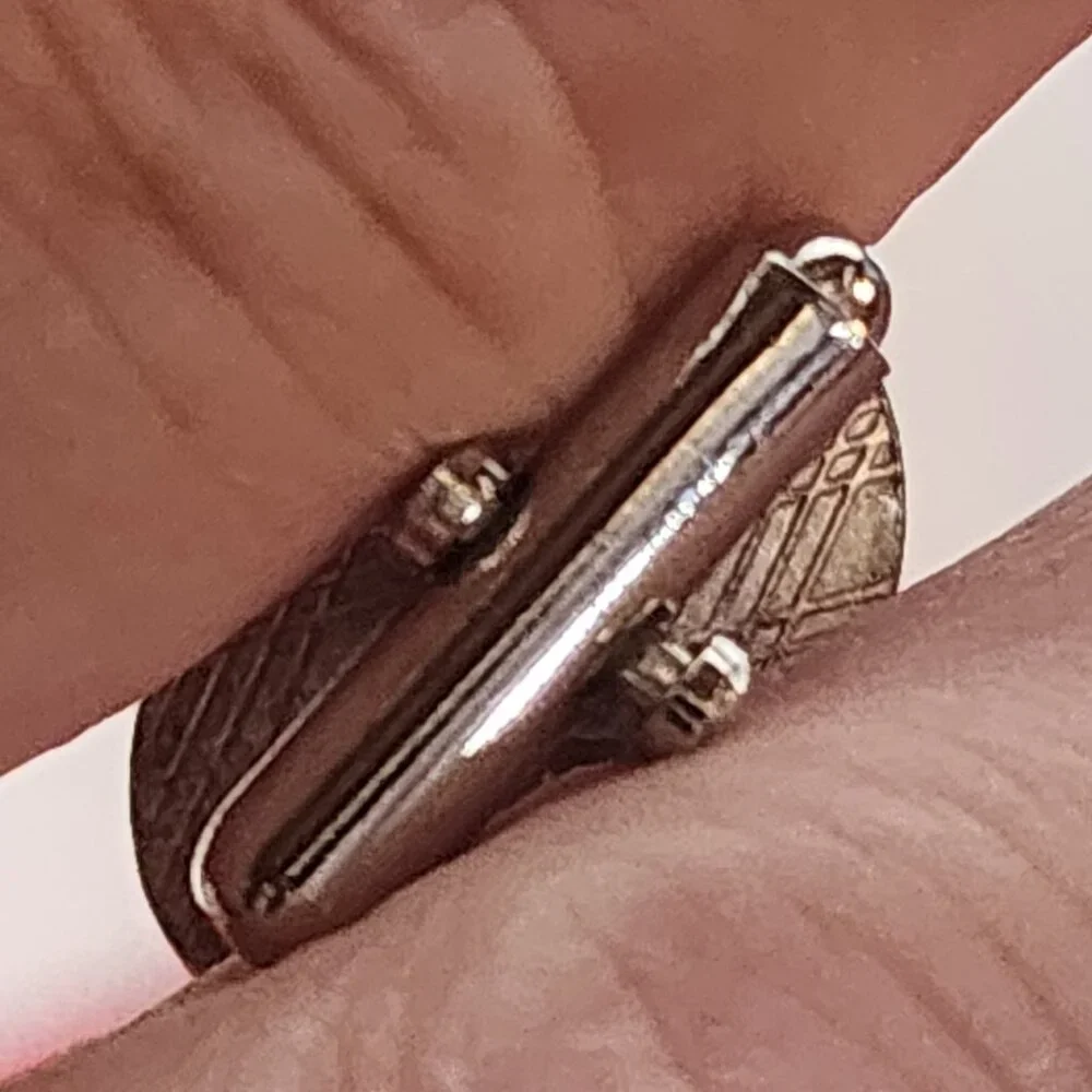 Source Unknown minimalist silver